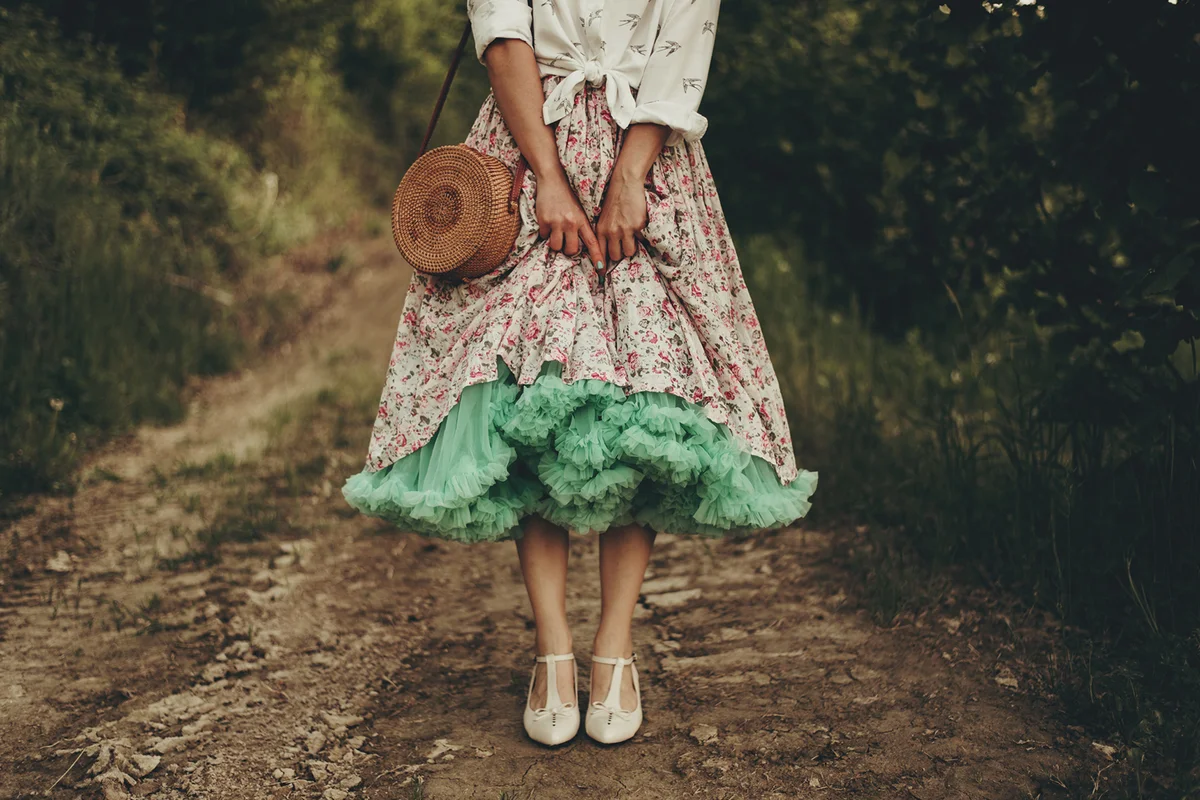 Woman With Fluffy Skirt Standing On A Country Path
