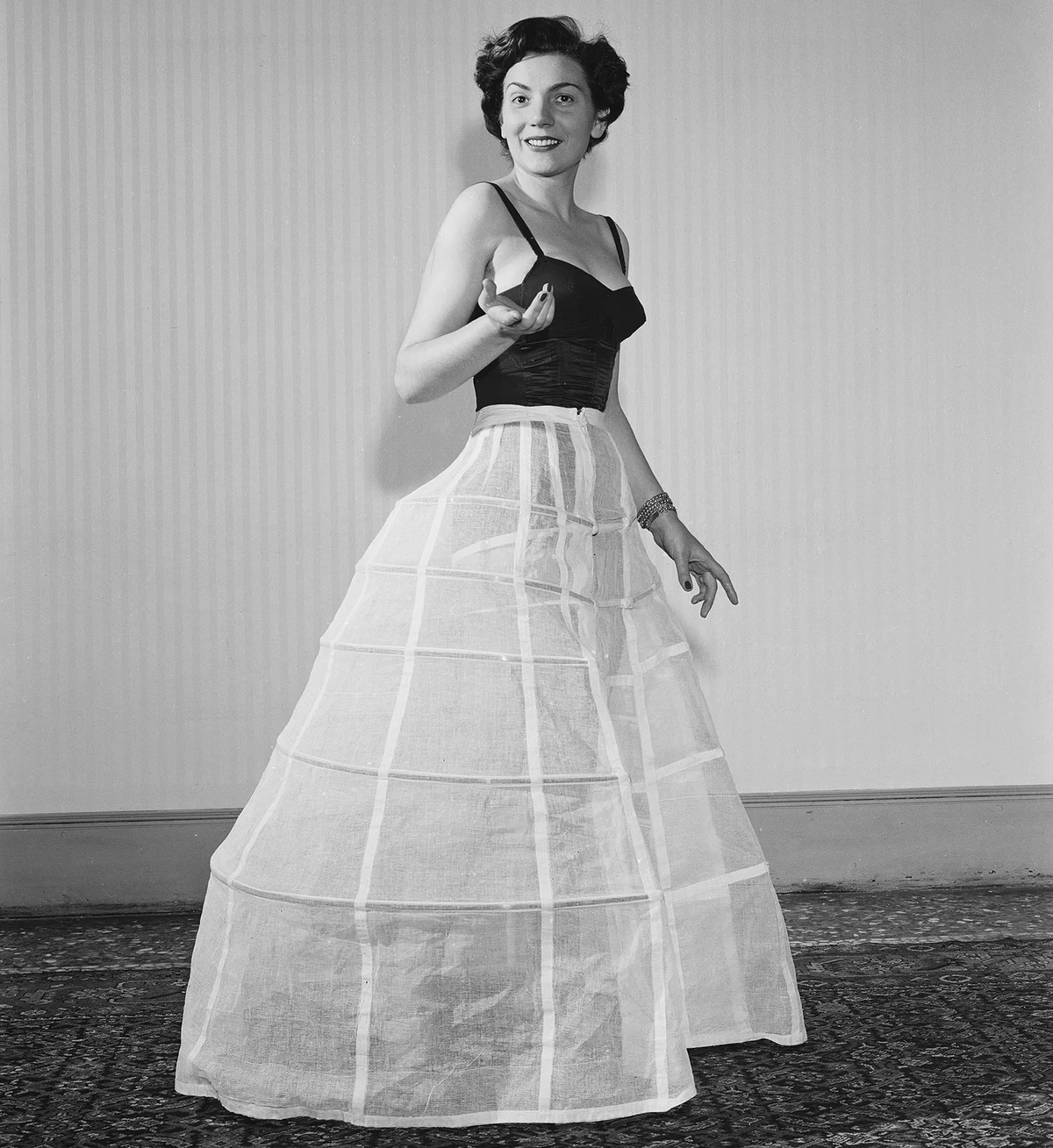 A model wearing a crinoline underskirt