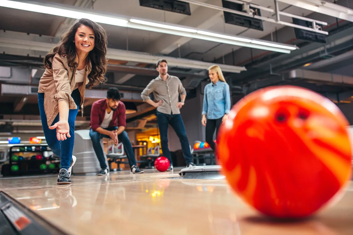 Group of friends bowling