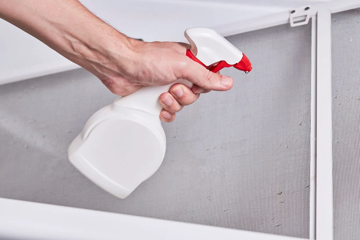 Cleaning and washing dusty mosquito net screen for window