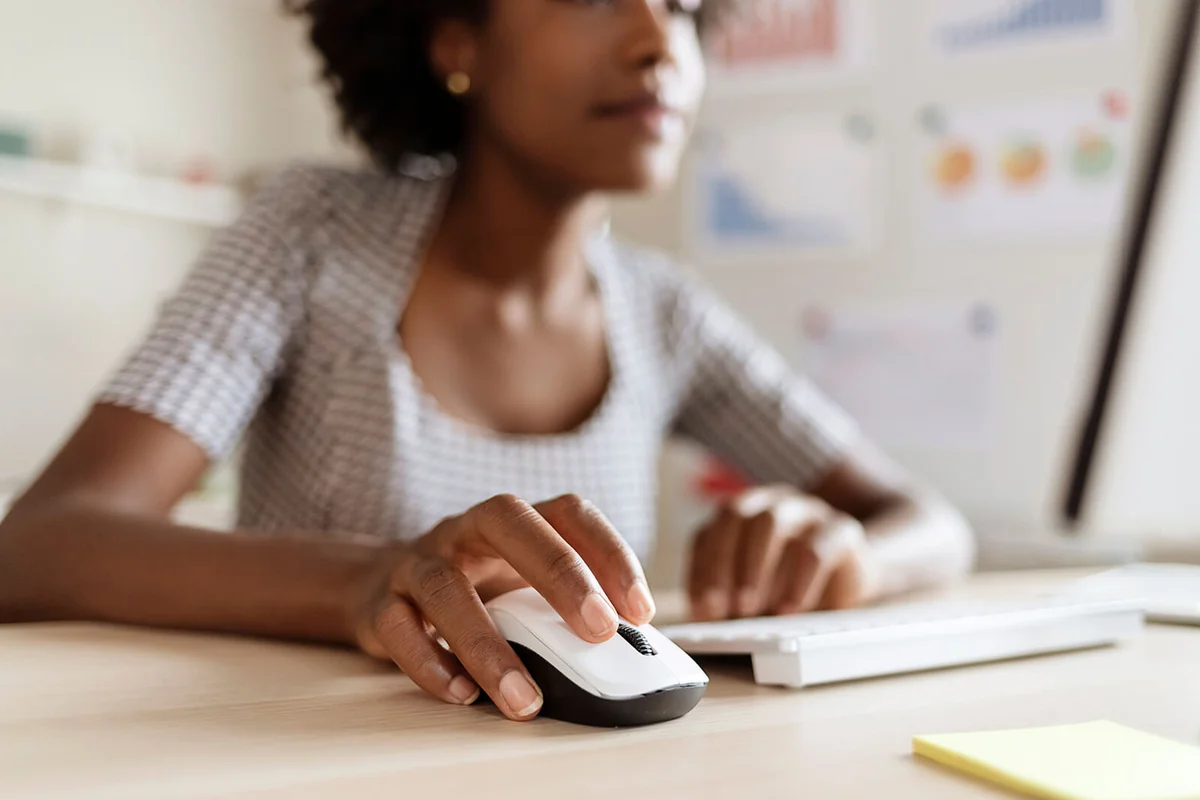 Business Woman using Computer Mouse