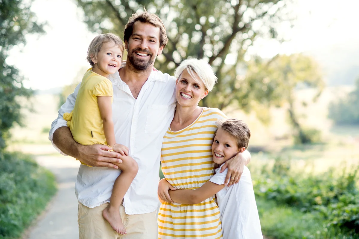 Portrait Of Young Family With Small Children