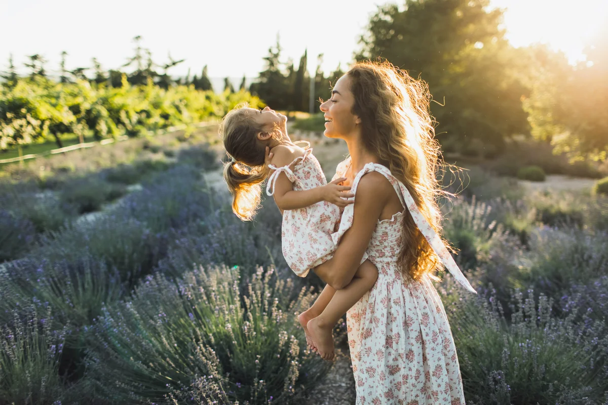 Mother and daughter in lavender field
