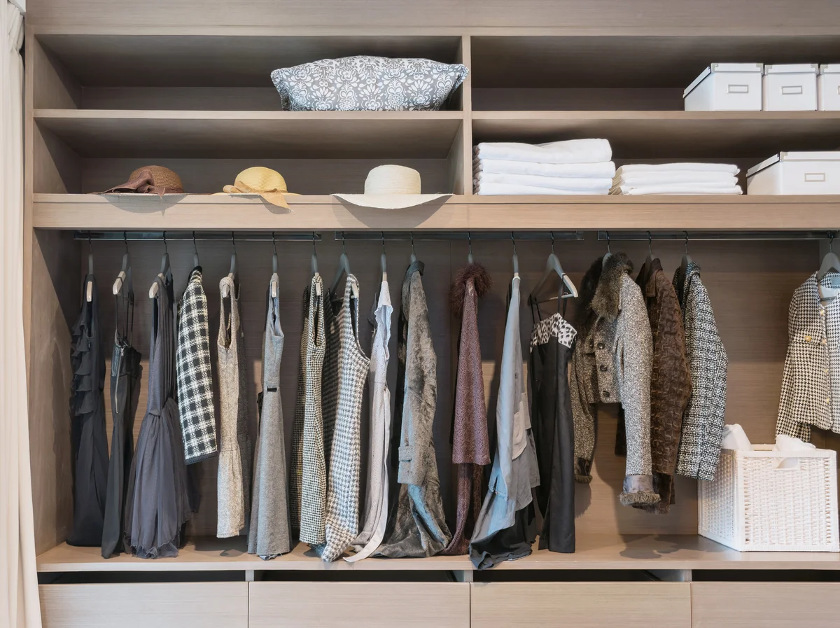 clothes hanging in rack