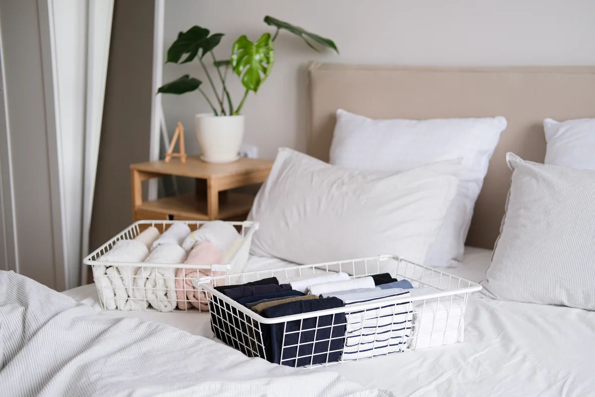 wire baskets on bed