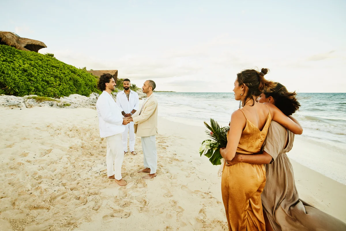 happy couple getting married on a beach