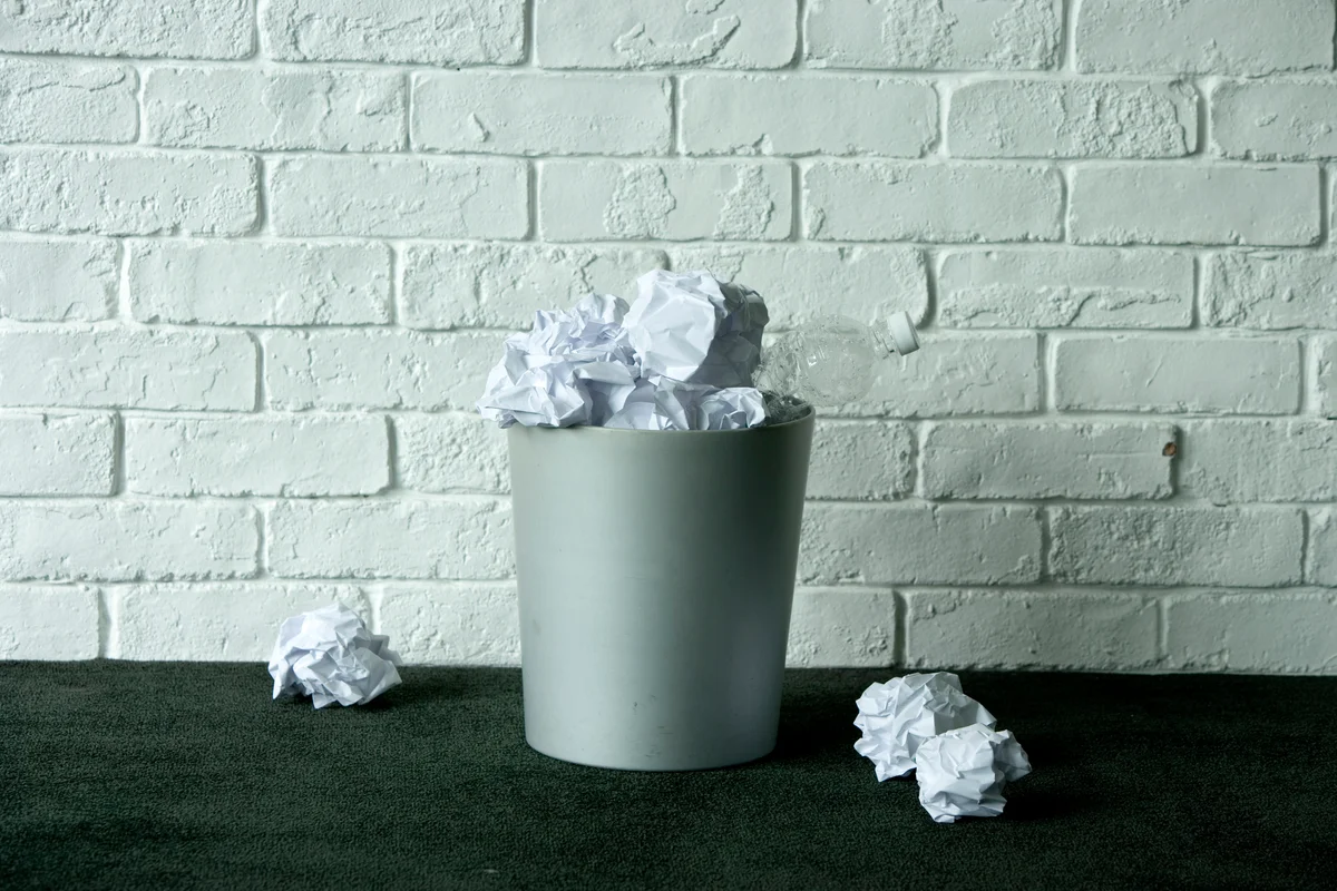 trash can full of paper