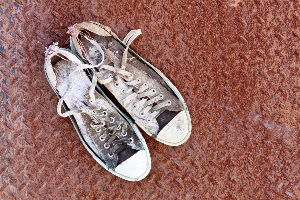 Crumbling old sneakers