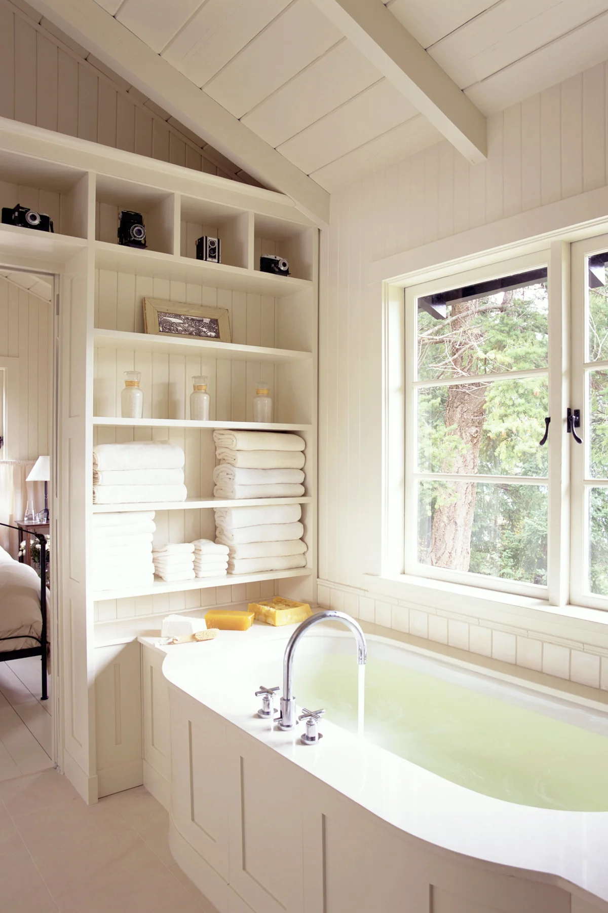Bathroom with shelves over the door