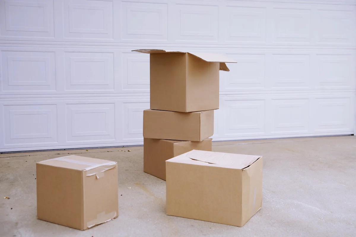 Cardboard boxes next to garage door