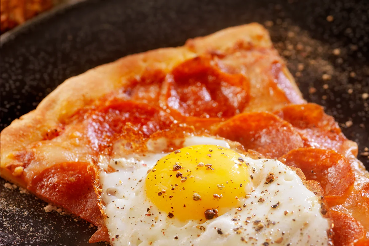 Hangover Breakfast,Leftover Pizza with a Fried Egg