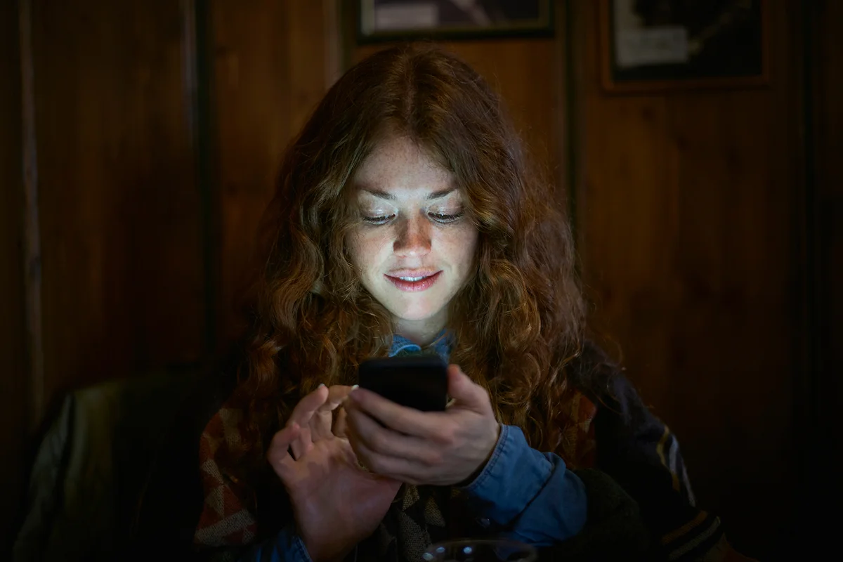 Woman text messaging on her phone