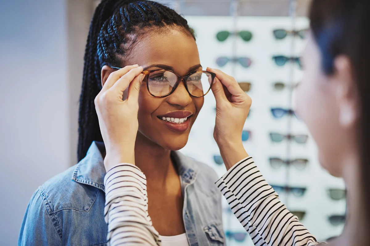 woman selecting glasses