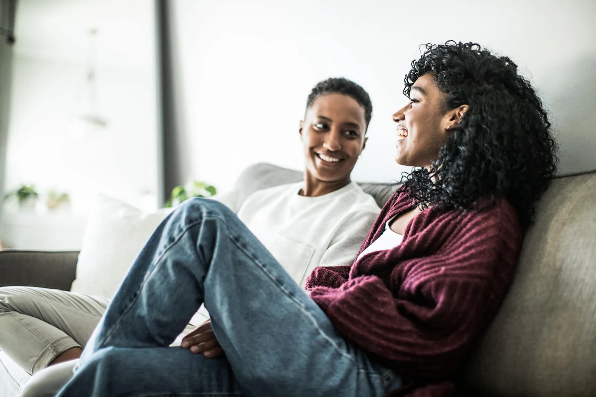 couple at home relaxing on couch