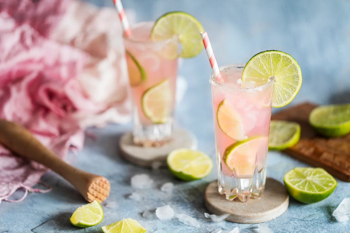 pink sour cocktails with grapefruit and lime