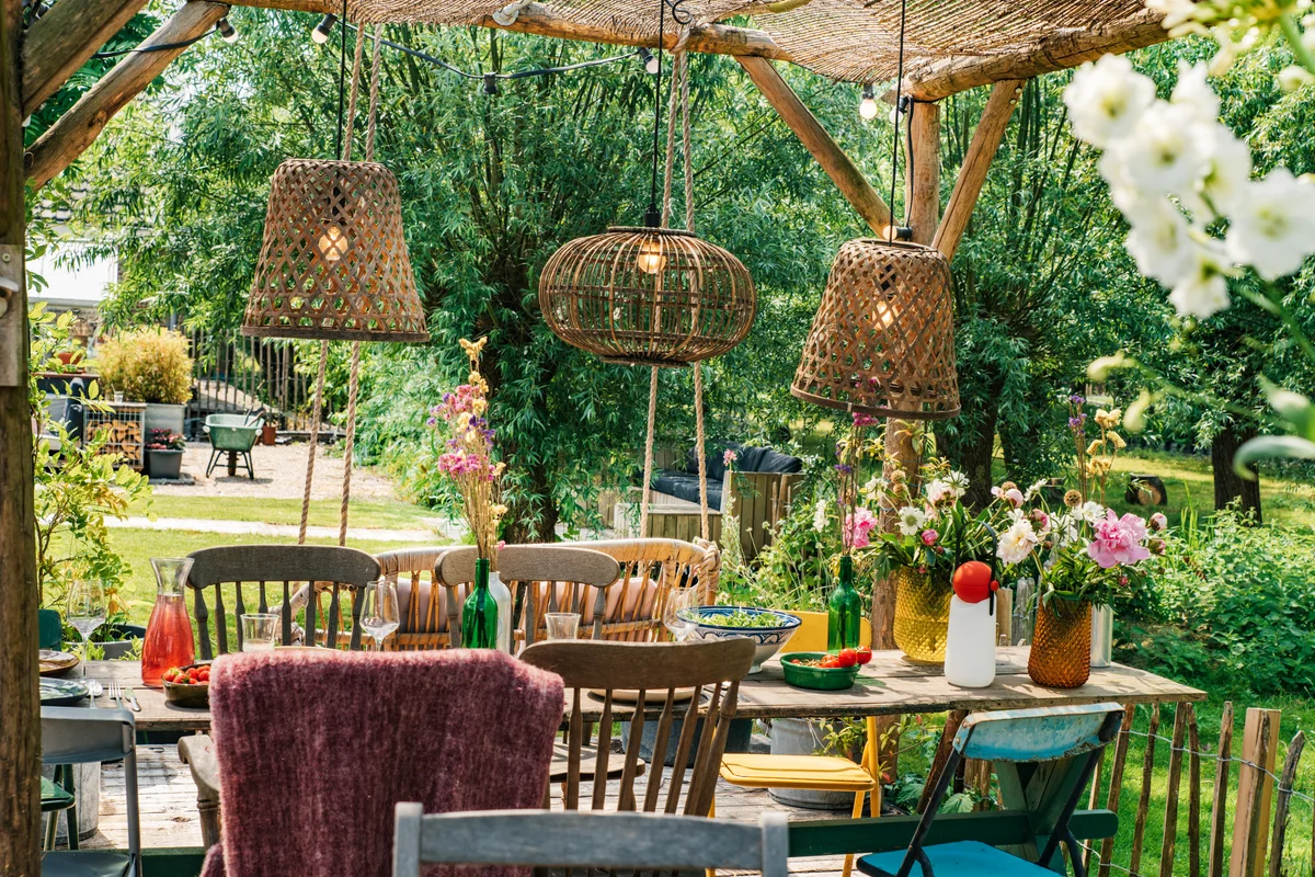 Colourful decorated table in summer setting.