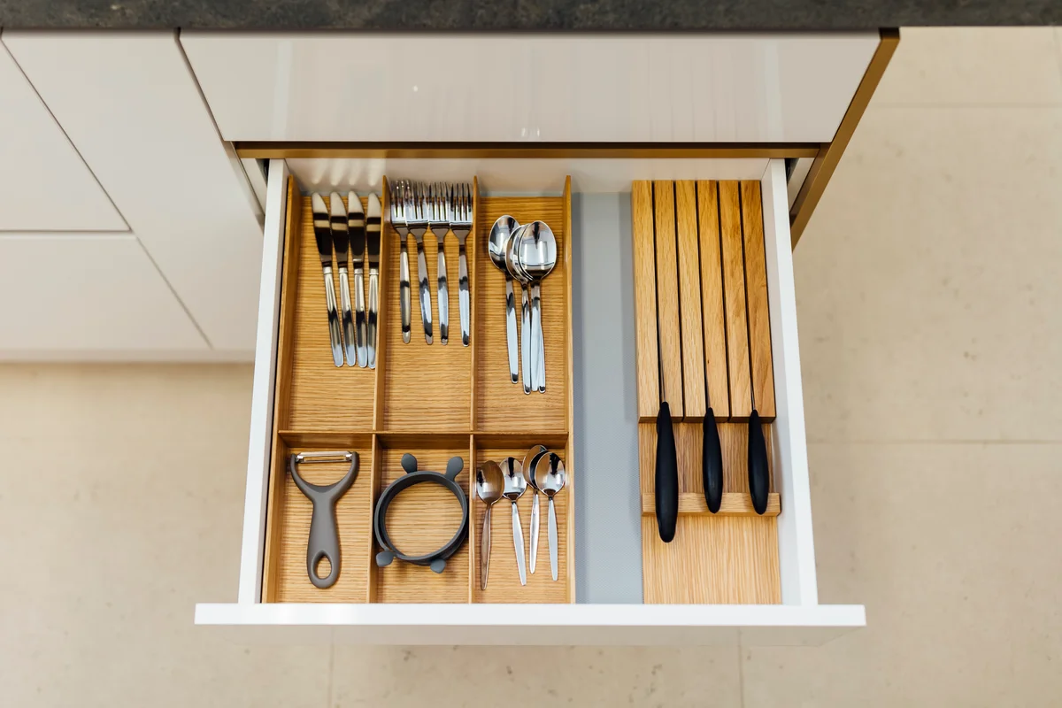 Cutlery trays in kitchen drawer