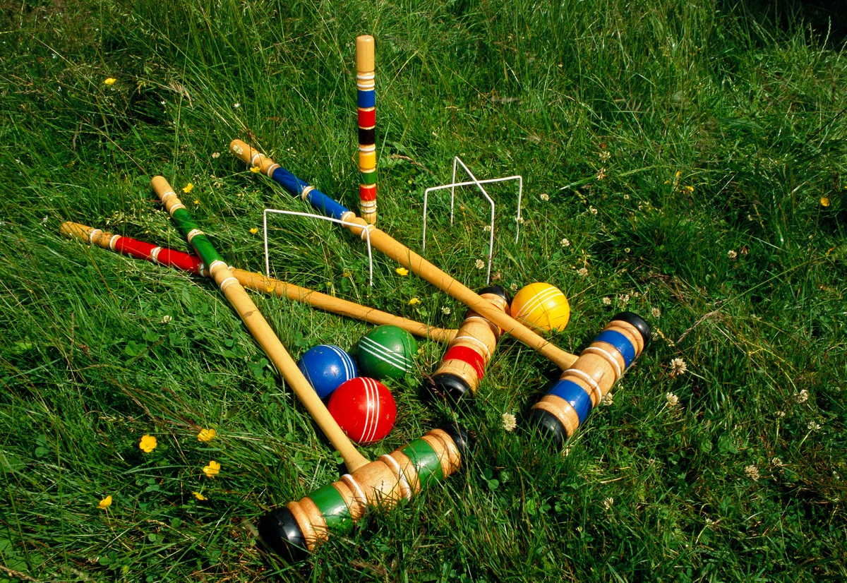 Croquet game lying on grass