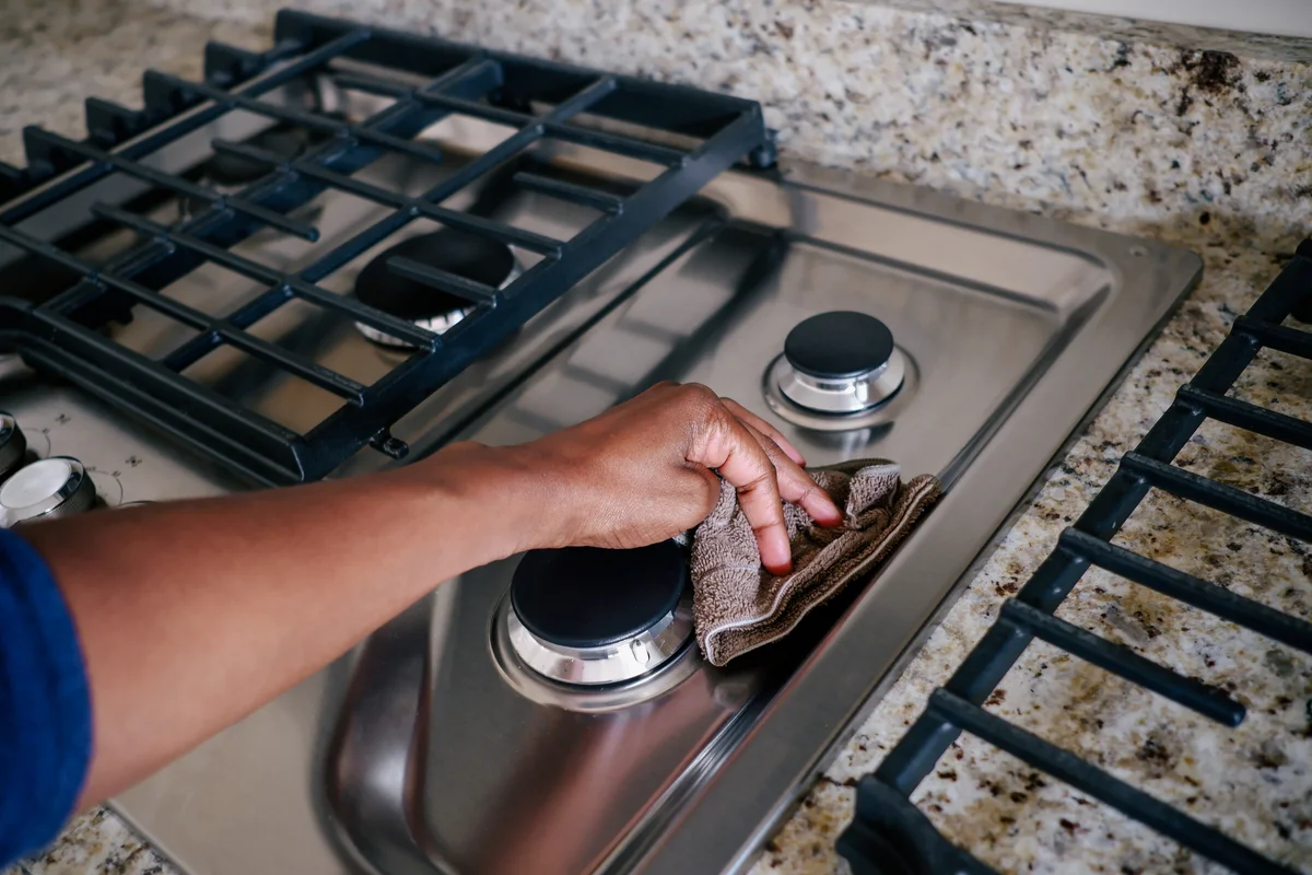 Wiping stainless steel cooktop