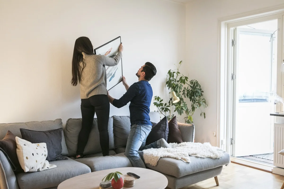 couple hanging framed art
