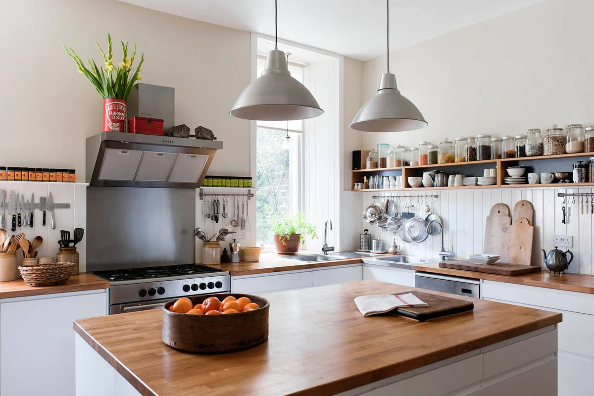 Spacious kitchen with open shelving and solid oak work surfaces