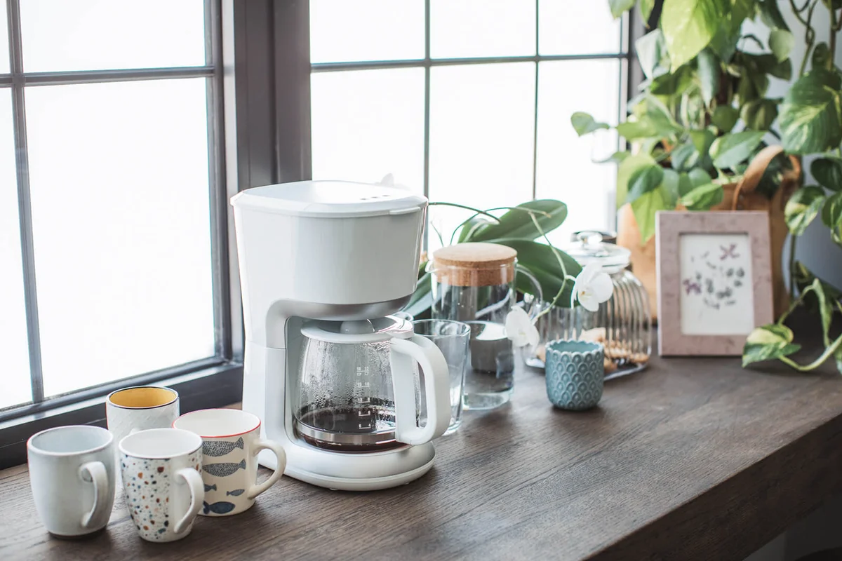 Coffee counter with coffee machine at living room