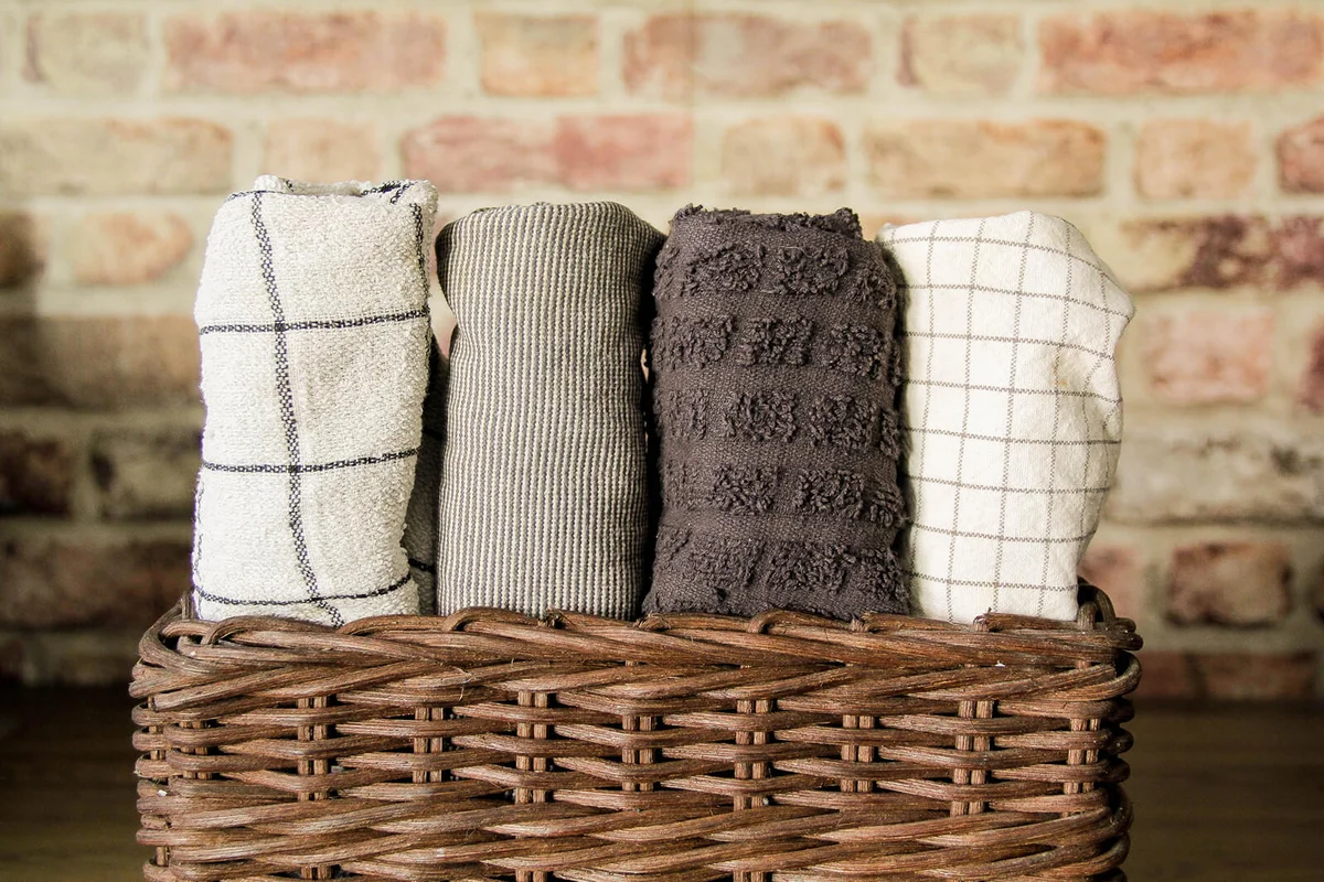Dish clothes arranged in a basket