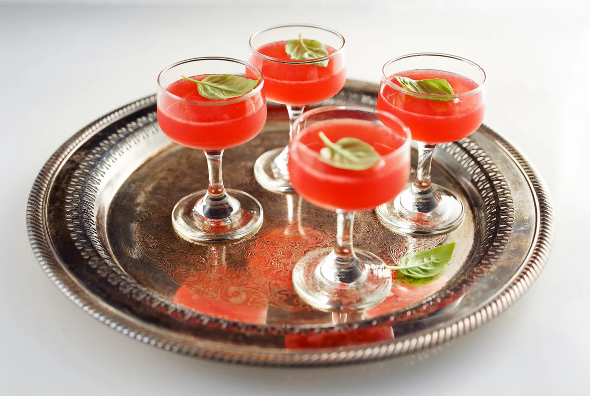 strawberry basil martini on a silver tray