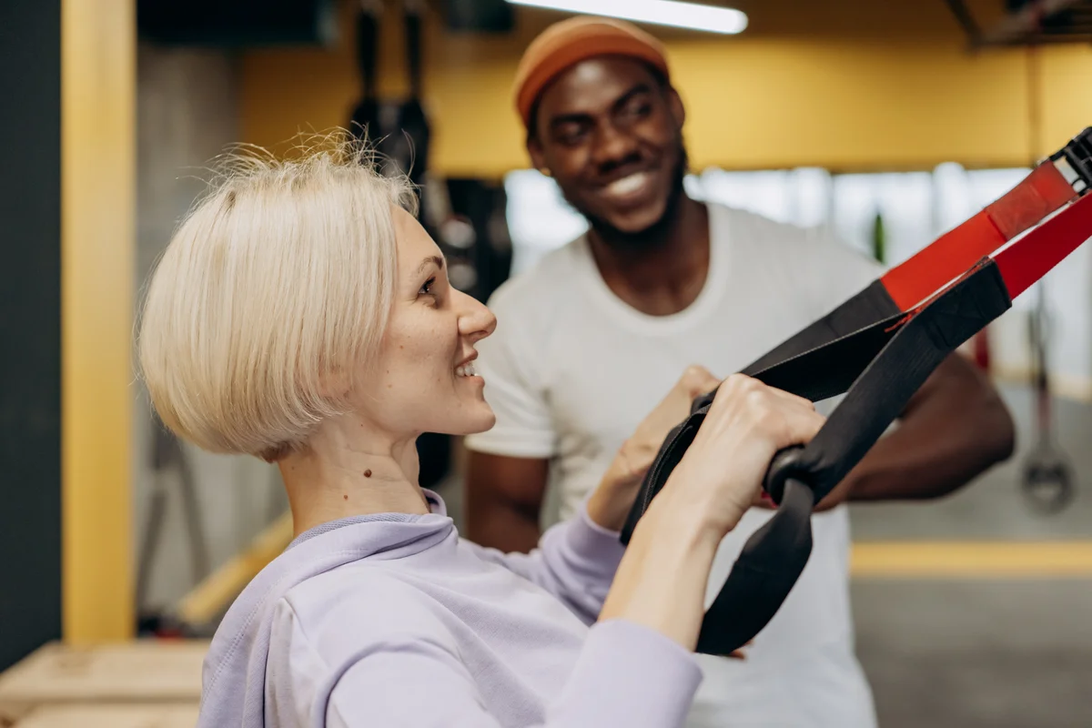 woman working out with trainer