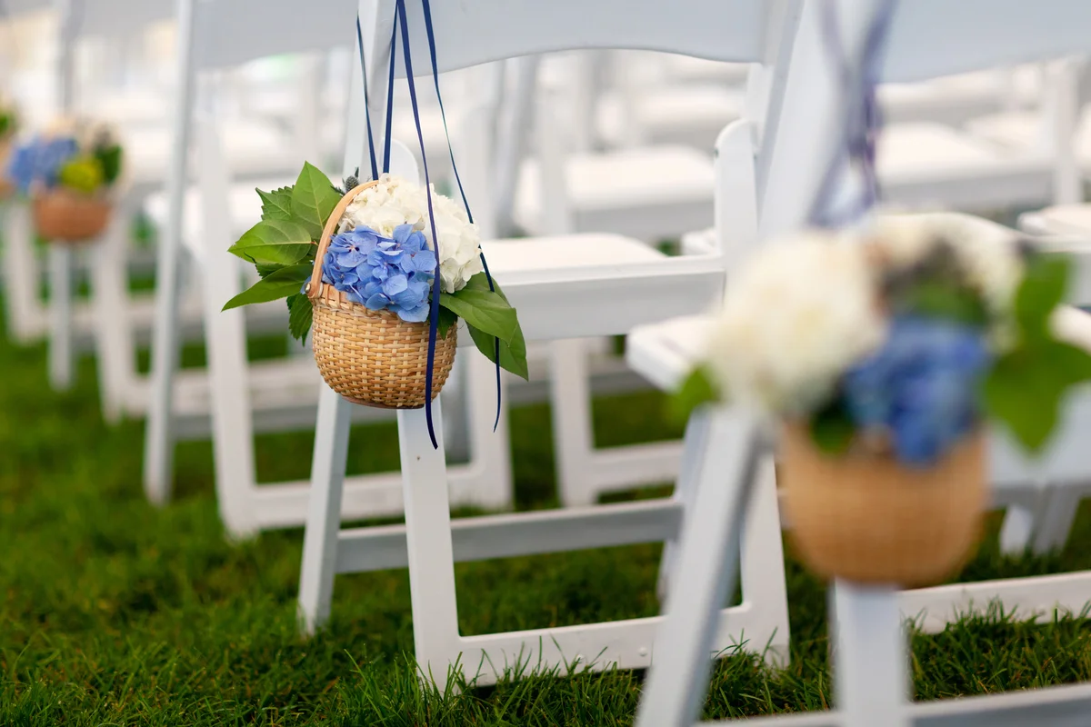 hydrangea basket on wedding aisle
