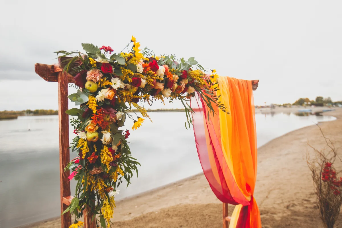 colorful wedding arch for beach wedding