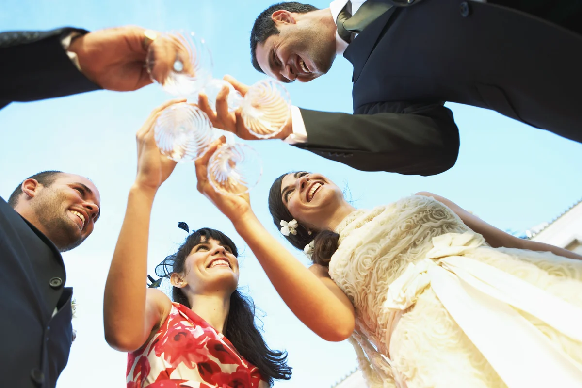 Couple sharing champagne toast