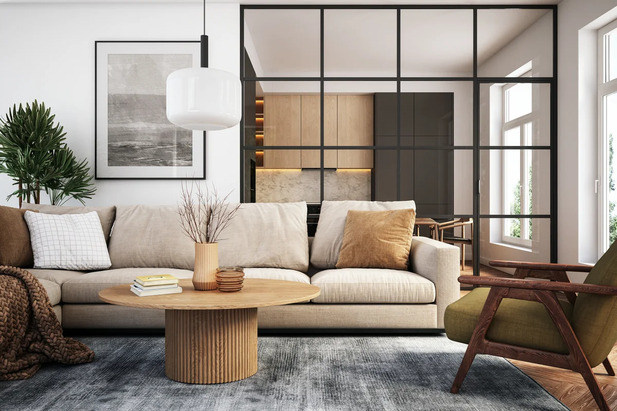 Living room with beige and green colored furniture and wooden elements