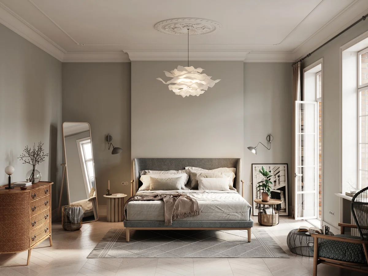 Elegant bedroom interior with double bed, side cabinet and mirror on side.