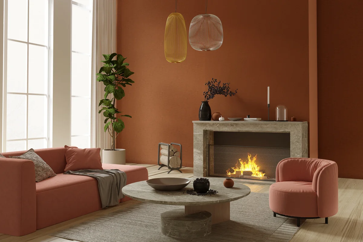 Living room interior with fireplace, orange armchair, sofa and coffee tables
