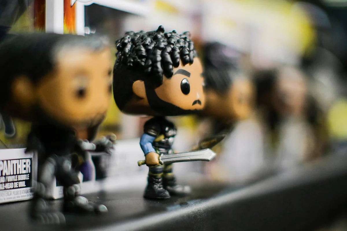 Black Panther bobble head dolls are displayed during the annual New York Toy Fair