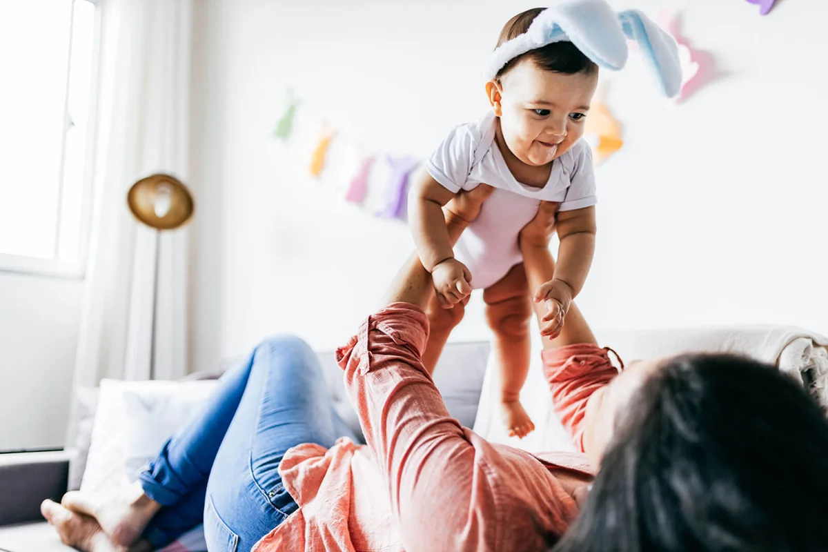 Mother and her baby celebrating Easter at home