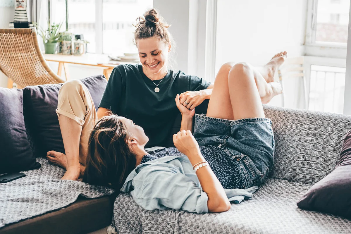 couple enjoying time together on a sofa