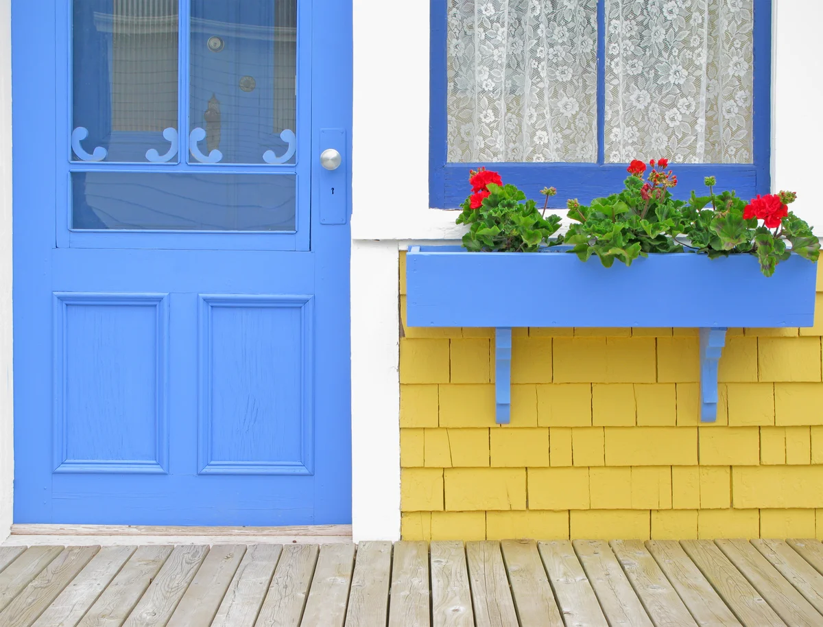 Blue front door and planter