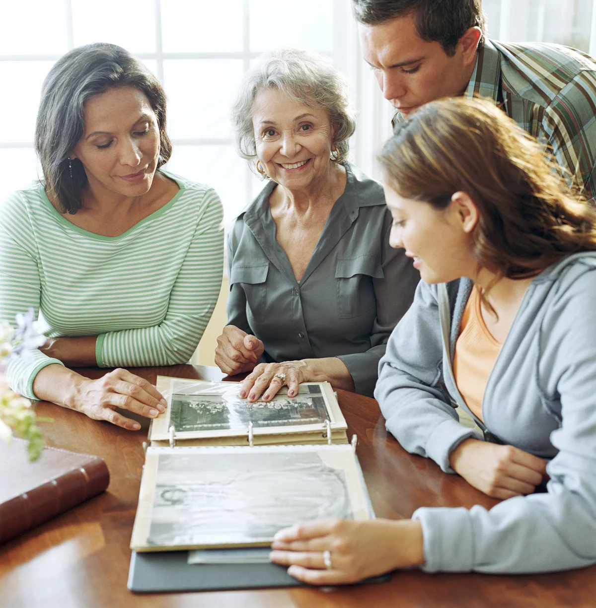 family looking at photos