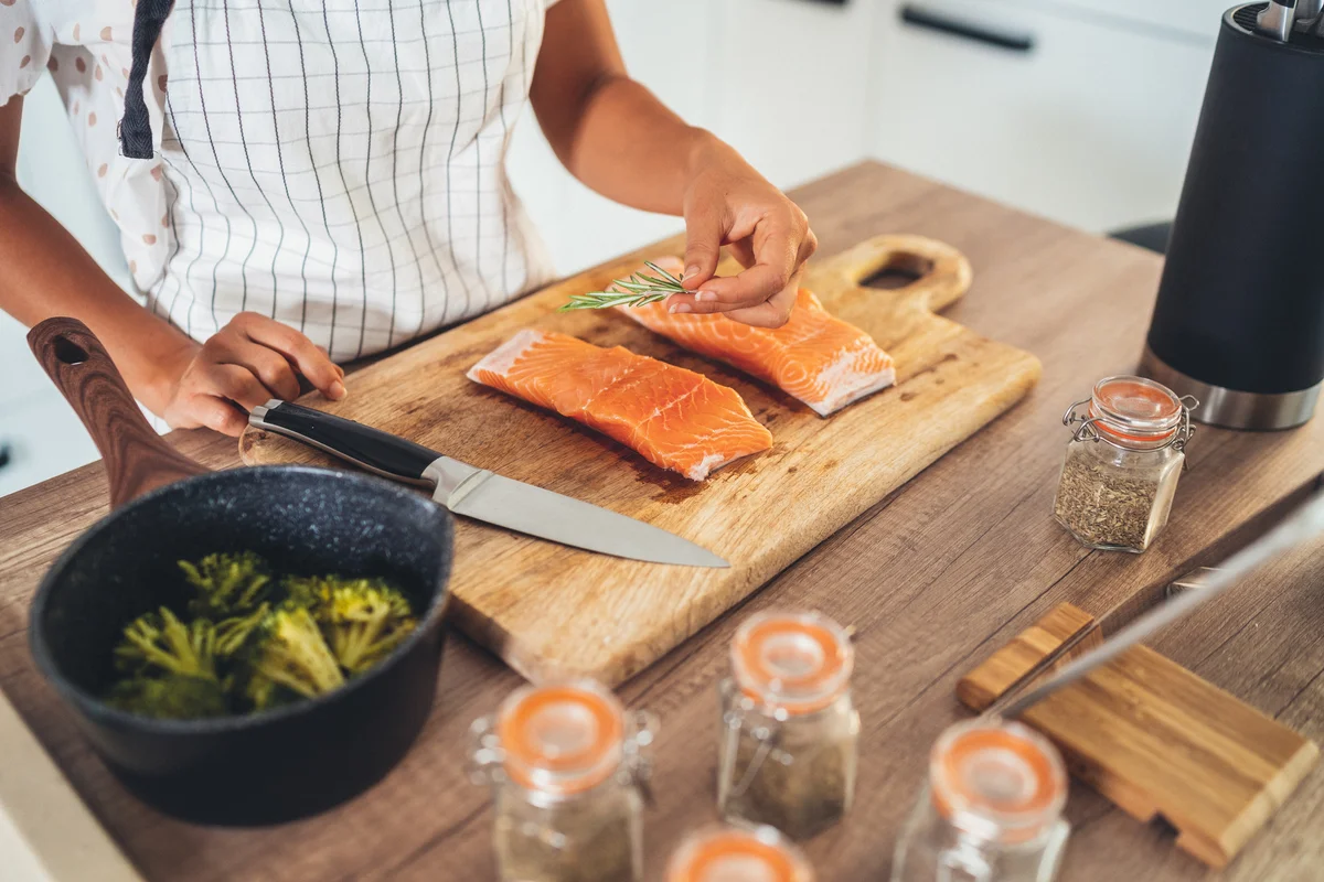Home cooking making salmon and broccoli