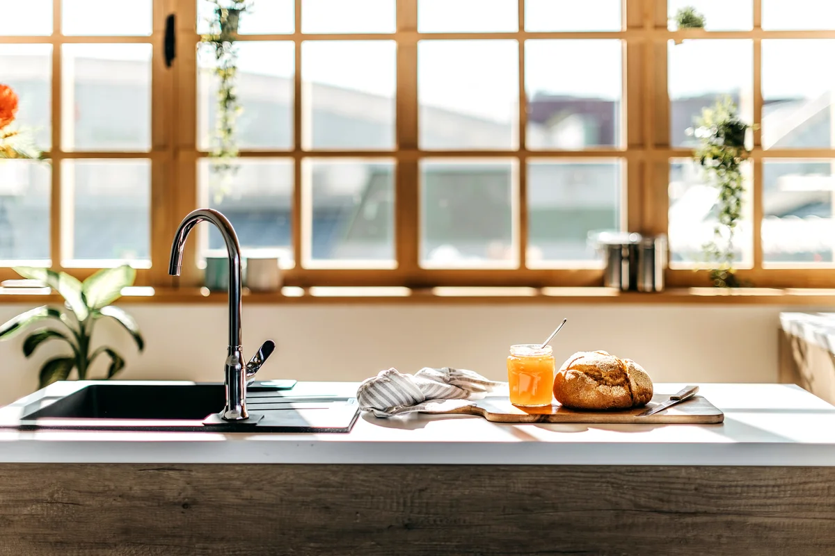 Clean kitchen with fresh bread on counter