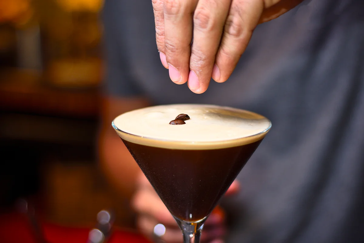 garnishing an espresso martini