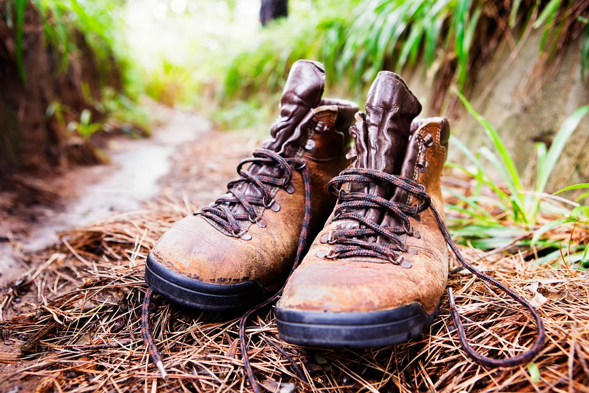 old battered hiking boots