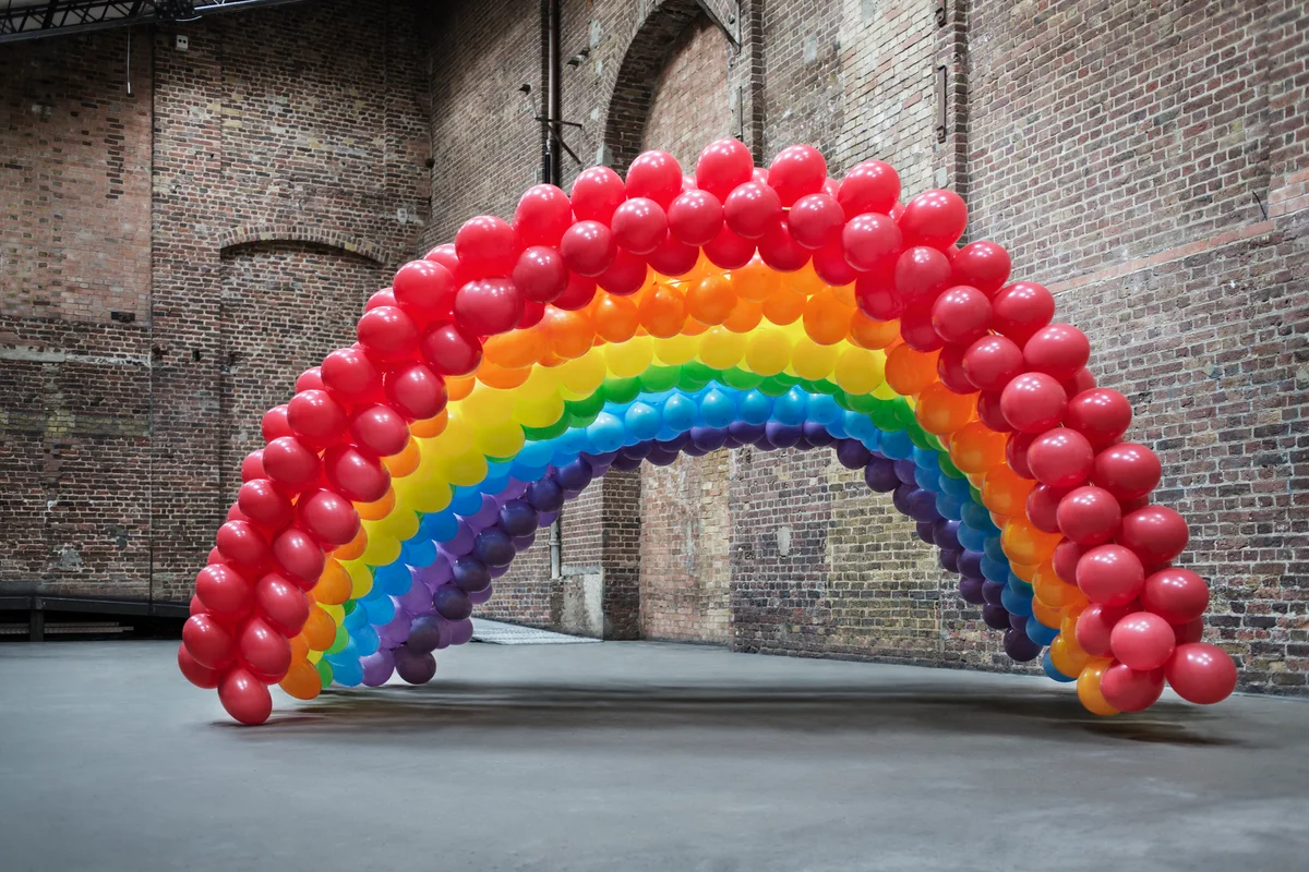 a Rainbow balloon arch