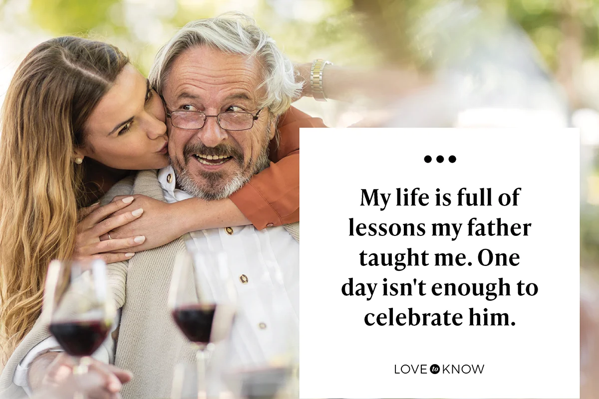 Adult daughter hugging father during lunch in garden