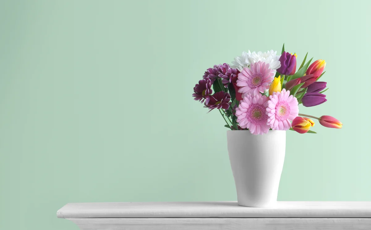 spring floral arrangement on a mantel