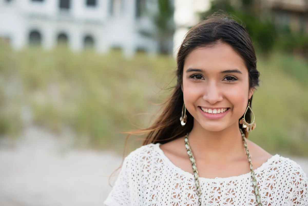 Photo of girl outside wearing neutral colors