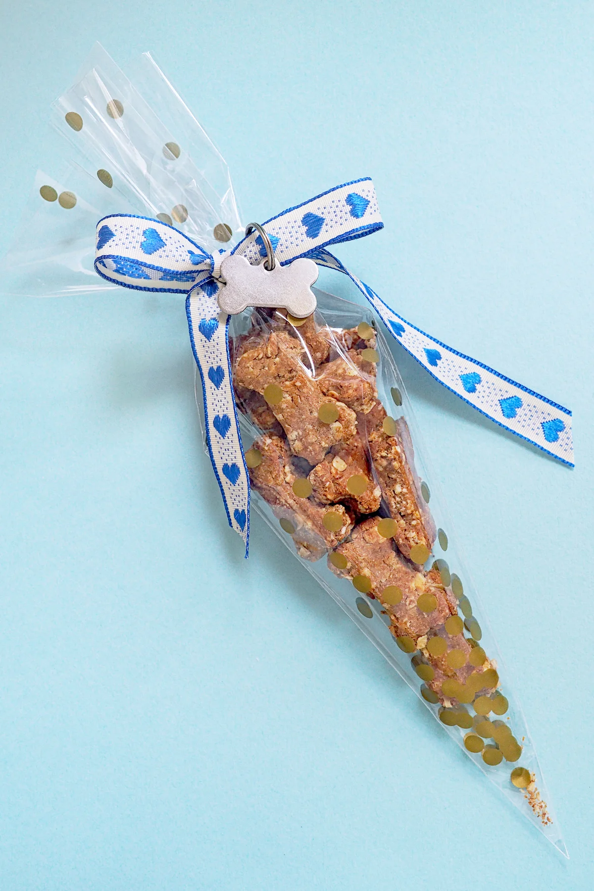 Homemade dog biscuits in a cellophane gift bag