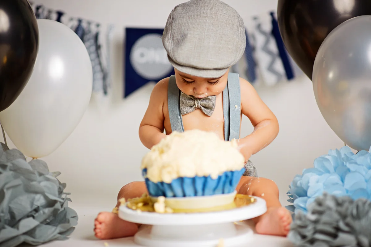 baby with smash cake